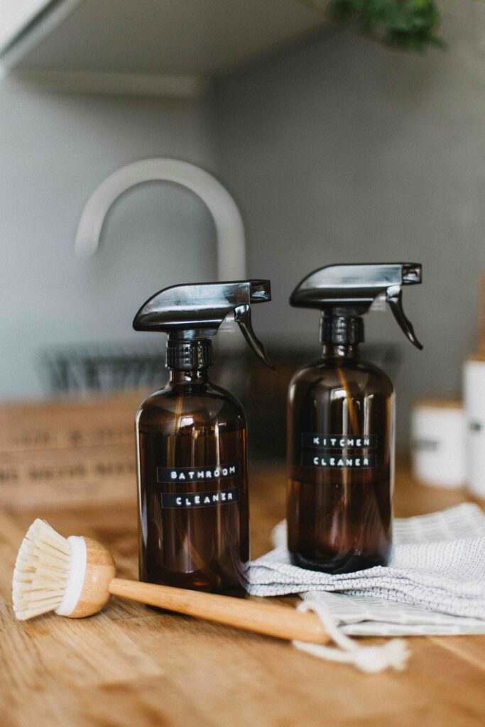 DIY bathroom cleaning spray and kitchen cleaning spray and scrub brush